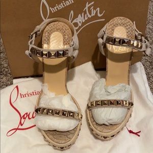 Christian Louboutin animal print wedges